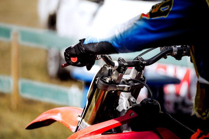 Hands on handlebar racer motorcycle